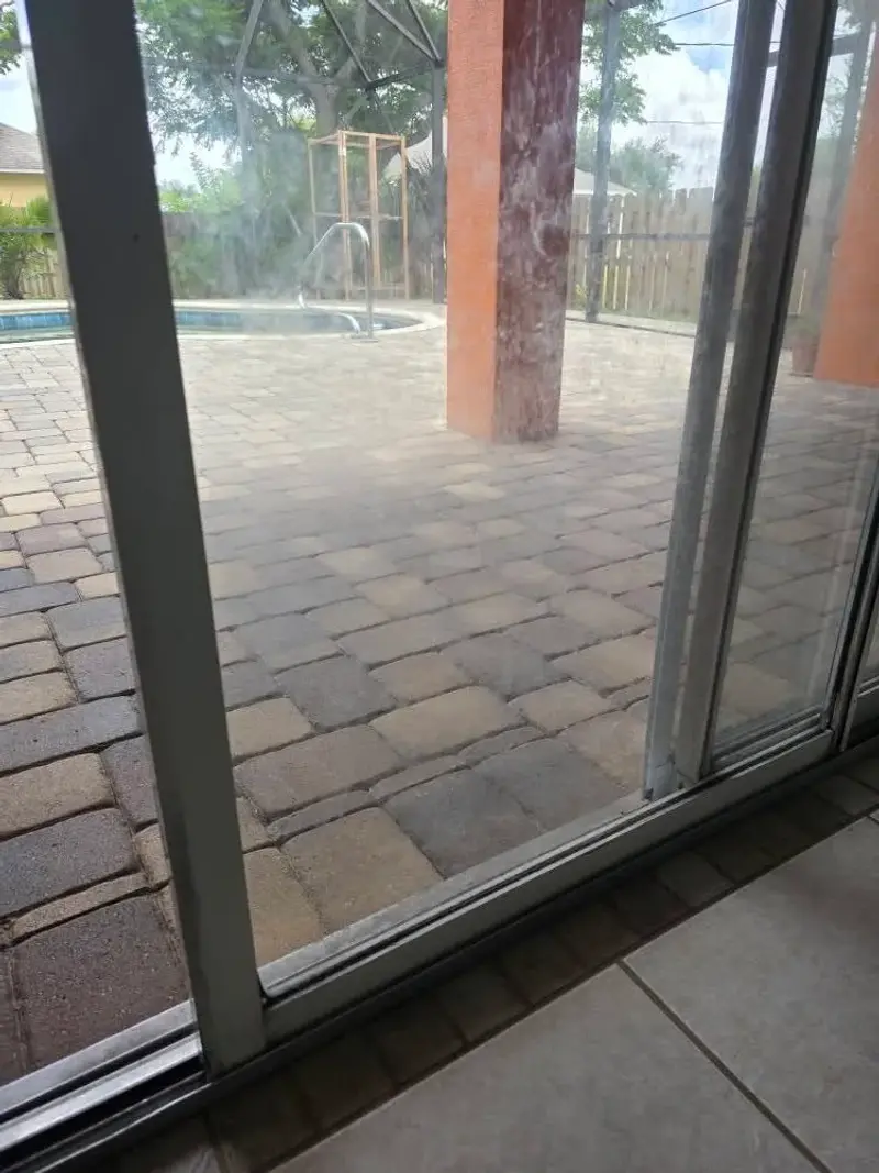 Sliding glass door before cleaning